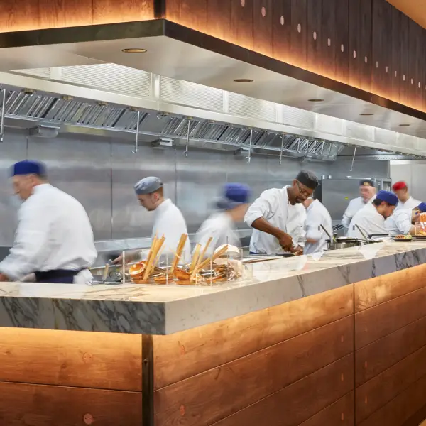 chefs cooking in a busy wagamama kitchen